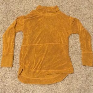 woman’s turtle neck sweater